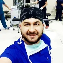 Op. Dr. Yasin Öztürk — Plastik Rekonstrüktif Ve Estetik Cerrahi, Ankara. Portre fotoğrafı.